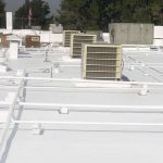Roof with new protective coating applied