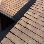 Newly repaired shingle roof
